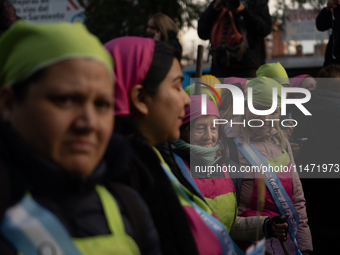 Pilgrims and workers are taking part in a march from the sanctuary at the San Cayetano Church to Plaza de Mayo Square in Buenos Aires, Argen...