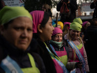 Pilgrims and workers are taking part in a march from the sanctuary at the San Cayetano Church to Plaza de Mayo Square in Buenos Aires, Argen...