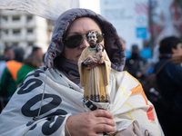 Pilgrims and workers are taking part in a march from the sanctuary at the San Cayetano Church to Plaza de Mayo Square in Buenos Aires, Argen...