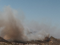 Severe wildfires are erupting across Attica, Greece, fueled by extreme heat, drought, and high winds in Neos Voutzas, Attica, Greece, on Aug...