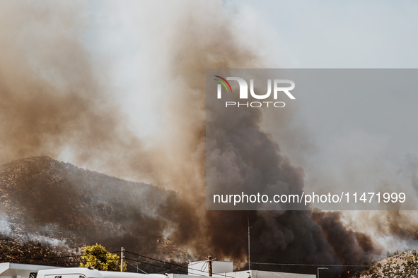 Severe wildfires are erupting across Attica, Greece, fueled by extreme heat, drought, and high winds since Sunday, in Nea Makri, Attica, Gre...