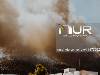 Severe wildfires are erupting across Attica, Greece, fueled by extreme heat, drought, and high winds since Sunday, in Nea Makri, Attica, Gre...