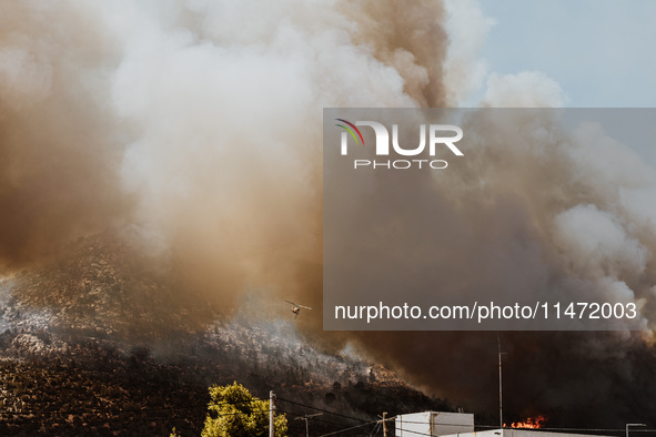 Severe wildfires are erupting across Attica, Greece, fueled by extreme heat, drought, and high winds since Sunday, in Nea Makri, Attica, Gre...