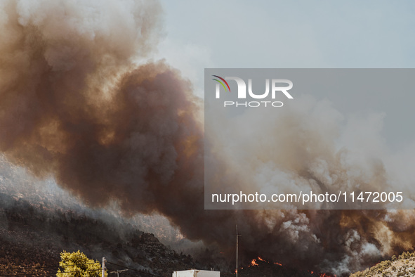 Severe wildfires are erupting across Attica, Greece, fueled by extreme heat, drought, and high winds since Sunday, in Nea Makri, Attica, Gre...