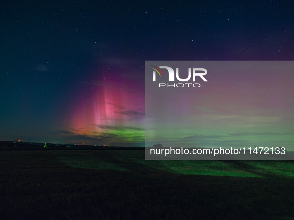 Wisconsin's night sky is glowing with the Northern Lights, as a geomagnetic storm is bringing vibrant pink and green colors, stealing the sp...