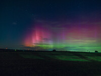 Wisconsin's night sky is glowing with the Northern Lights, as a geomagnetic storm is bringing vibrant pink and green colors, stealing the sp...