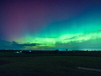 Wisconsin's night sky is glowing with the Northern Lights, as a geomagnetic storm is bringing vibrant pink and green colors, stealing the sp...