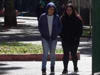 Pedestrians are protecting themselves from the cold in the central region of Sao Paulo, Brazil, on Monday, August 12. (