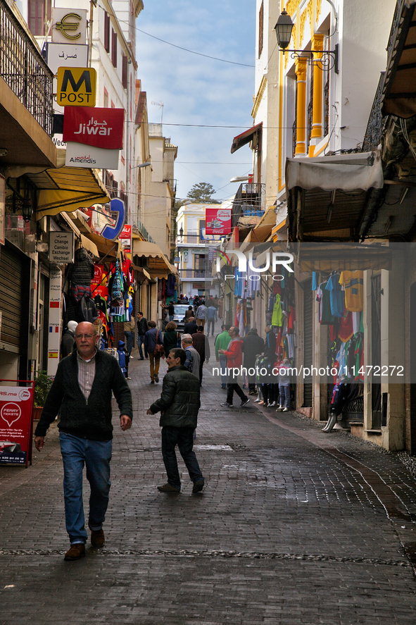 A busy street is bustling in Tangier, Morocco, Africa. 