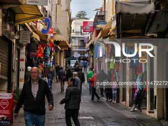 A busy street is bustling in Tangier, Morocco, Africa. (