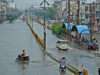 Vehicles are moving through the waterlogged Sikar Road following heavy monsoon rains in Jaipur, Rajasthan, India, on Monday, August 12, 2024...