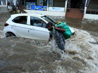 Vehicles are moving through the waterlogged Sikar Road following heavy monsoon rains in Jaipur, Rajasthan, India, on Monday, August 12, 2024...