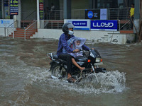 Vehicles are moving through the waterlogged Sikar Road following heavy monsoon rains in Jaipur, Rajasthan, India, on Monday, August 12, 2024...