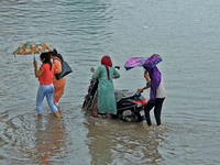 Vehicles are moving through the waterlogged Sikar Road following heavy monsoon rains in Jaipur, Rajasthan, India, on Monday, August 12, 2024...