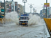 Vehicles are moving through the waterlogged Sikar Road following heavy monsoon rains in Jaipur, Rajasthan, India, on Monday, August 12, 2024...