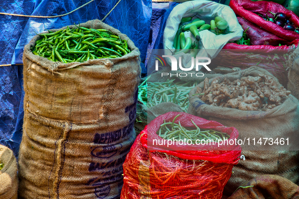 Sacks are being filled with vegetables at the Chalai market in Thiruvananthapuram, Kerala, India, on April 13, 2024. The Chalai Market (Chal...