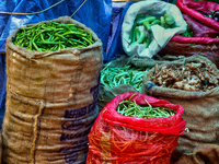 Sacks are being filled with vegetables at the Chalai market in Thiruvananthapuram, Kerala, India, on April 13, 2024. The Chalai Market (Chal...