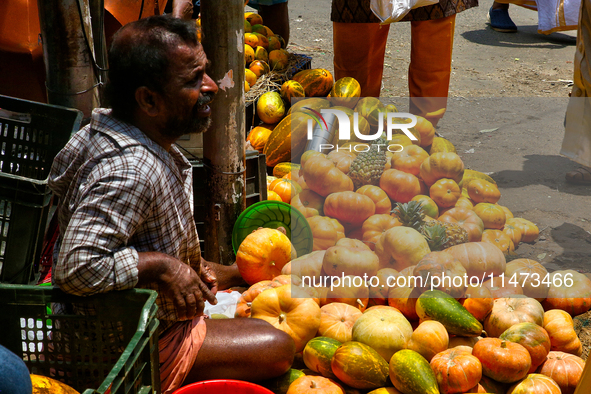 A man is selling fruits and vegetables at the Chalai market in Thiruvananthapuram, Kerala, India, on April 13, 2024. The Chalai Market (Chal...