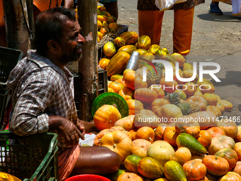 A man is selling fruits and vegetables at the Chalai market in Thiruvananthapuram, Kerala, India, on April 13, 2024. The Chalai Market (Chal...