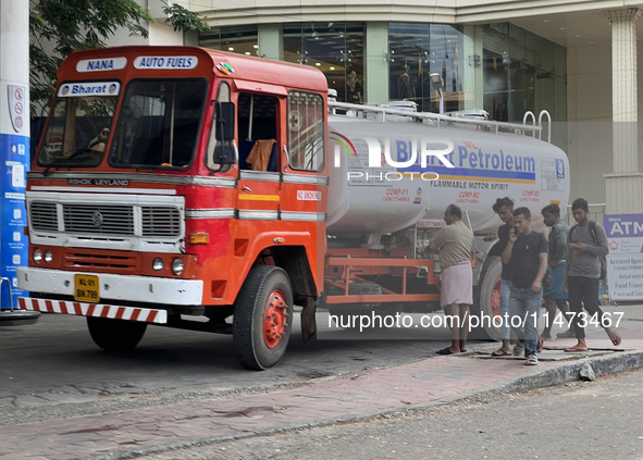 A Bharat Petroleum fuel tanker is unloading fuel at a petrol pump in Thiruvananthapuram (Trivandrum), Kerala, India, on April 14, 2024. 