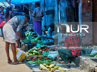 A man is purchasing vegetables at the Chalai market in Thiruvananthapuram, Kerala, India, on April 13, 2024. The Chalai Market (Chalai bazaa...