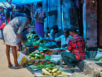 A man is purchasing vegetables at the Chalai market in Thiruvananthapuram, Kerala, India, on April 13, 2024. The Chalai Market (Chalai bazaa...