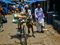 A busy street is bustling at the Chalai market in Thiruvananthapuram (Trivandrum), Kerala, India, on April 13, 2024. The Chalai Market (Chal...