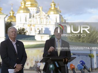 United States Senators Lindsey Graham and Richard Blumenthal are holding a briefing in Mykhailivska Square outside the St. Michael's Golden-...