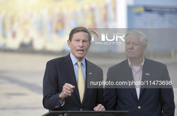 United States Senators Richard Blumenthal (L) and Lindsey Graham are holding a briefing in Mykhailivska Square outside the St. Michael's Gol...