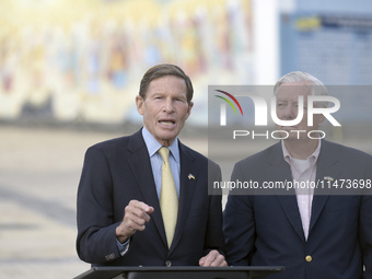 United States Senators Richard Blumenthal (L) and Lindsey Graham are holding a briefing in Mykhailivska Square outside the St. Michael's Gol...