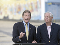 United States Senators Richard Blumenthal (L) and Lindsey Graham are holding a briefing in Mykhailivska Square outside the St. Michael's Gol...