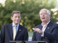 United States Senators Richard Blumenthal (L) and Lindsey Graham are holding a briefing in Mykhailivska Square outside the St. Michael's Gol...