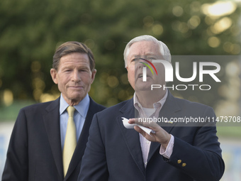 United States Senators Richard Blumenthal (L) and Lindsey Graham are holding a briefing in Mykhailivska Square outside the St. Michael's Gol...