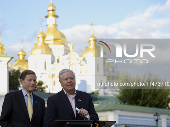 United States Senators Richard Blumenthal (L) and Lindsey Graham are holding a briefing in Mykhailivska Square outside the St. Michael's Gol...