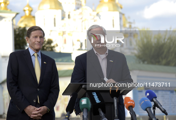 United States Senators Richard Blumenthal (L) and Lindsey Graham are holding a briefing in Mykhailivska Square outside the St. Michael's Gol...