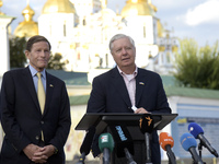 United States Senators Richard Blumenthal (L) and Lindsey Graham are holding a briefing in Mykhailivska Square outside the St. Michael's Gol...