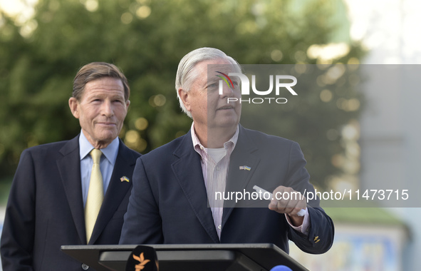 United States Senators Richard Blumenthal (L) and Lindsey Graham are holding a briefing in Mykhailivska Square outside the St. Michael's Gol...