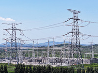 An aerial photo is showing the 1000 kV UHV AC power transmission and transformation project in Zaozhuang, China, on August 12, 2024. The 100...