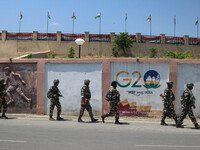 Security personnel are patrolling along a road ahead of India's Independence Day celebrations in Srinagar, Jammu and Kashmir, on August 13,...