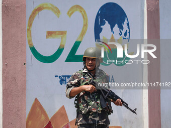 An Indian security personnel is standing alert ahead of India's Independence Day celebrations in Srinagar, Jammu and Kashmir, on August 13,...