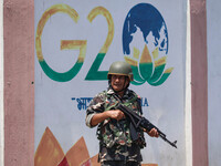 An Indian security personnel is standing alert ahead of India's Independence Day celebrations in Srinagar, Jammu and Kashmir, on August 13,...