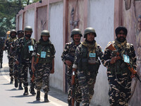 Security personnel are patrolling along a road ahead of India's Independence Day celebrations in Srinagar, Jammu and Kashmir, on August 13,...