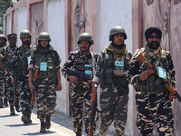 Security personnel are patrolling along a road ahead of India's Independence Day celebrations in Srinagar, Jammu and Kashmir, on August 13,...