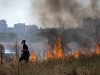 Dry grass and brush are burning between Sofia Airport and Hristo Botev district on August 13, 2024, in Sofia, Bulgaria. Bulgaria is ranking...