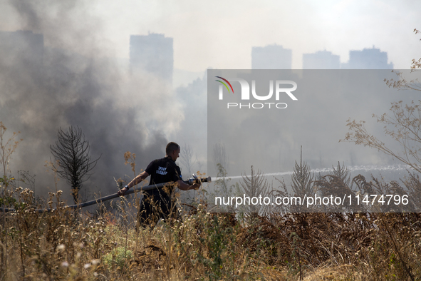 Dry grass and brush are burning between Sofia Airport and Hristo Botev district on August 13, 2024, in Sofia, Bulgaria. Bulgaria is ranking...