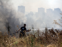 Dry grass and brush are burning between Sofia Airport and Hristo Botev district on August 13, 2024, in Sofia, Bulgaria. Bulgaria is ranking...