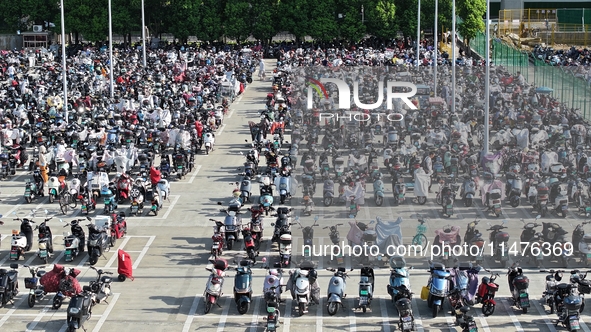 Electric bicycles are being seen at an electric vehicle parking lot near the Suzhou Rail Transit Line 11 Kunshan Huaqiao Station in Suzhou,...