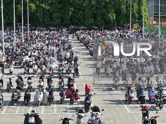 Electric bicycles are being seen at an electric vehicle parking lot near the Suzhou Rail Transit Line 11 Kunshan Huaqiao Station in Suzhou,...