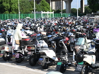 Electric bicycles are being seen at an electric vehicle parking lot near the Suzhou Rail Transit Line 11 Kunshan Huaqiao Station in Suzhou,...