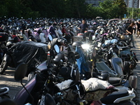 Electric bicycles are being seen at an electric vehicle parking lot near the Suzhou Rail Transit Line 11 Kunshan Huaqiao Station in Suzhou,...